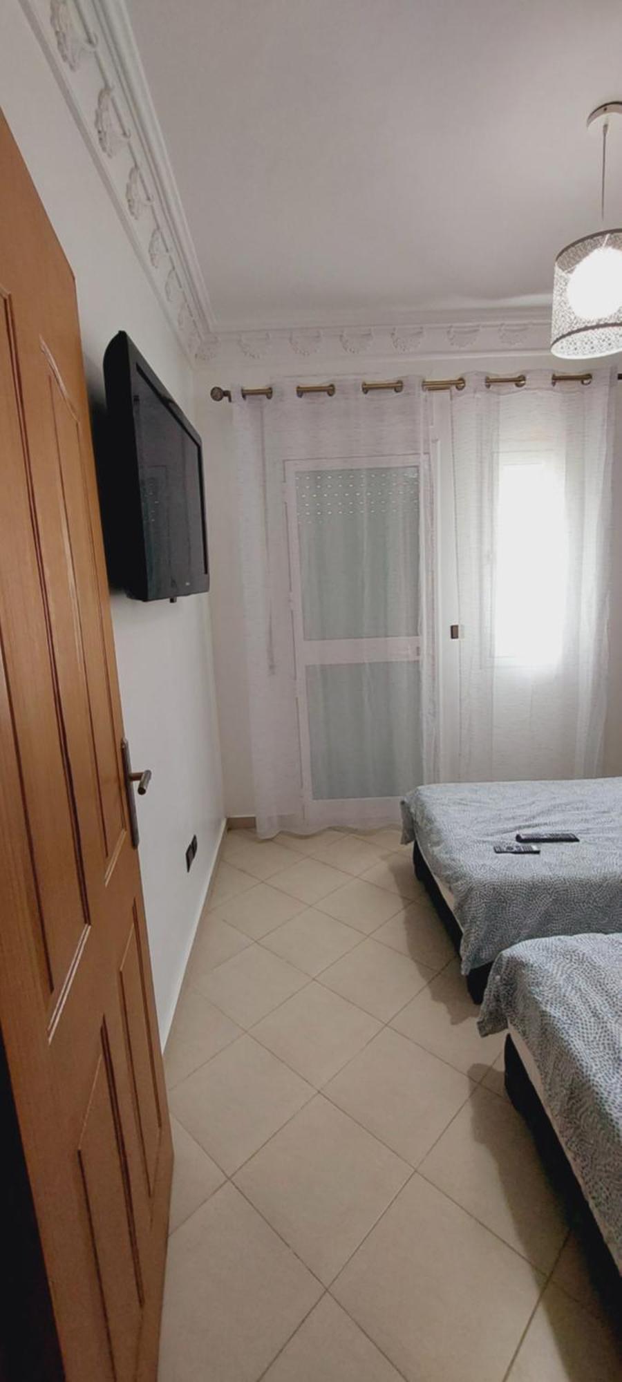 Appartement Avec Piscines, Vue Sur Mer Et Acces A La Plage A Achakar Hill, Tanger. Exterior foto